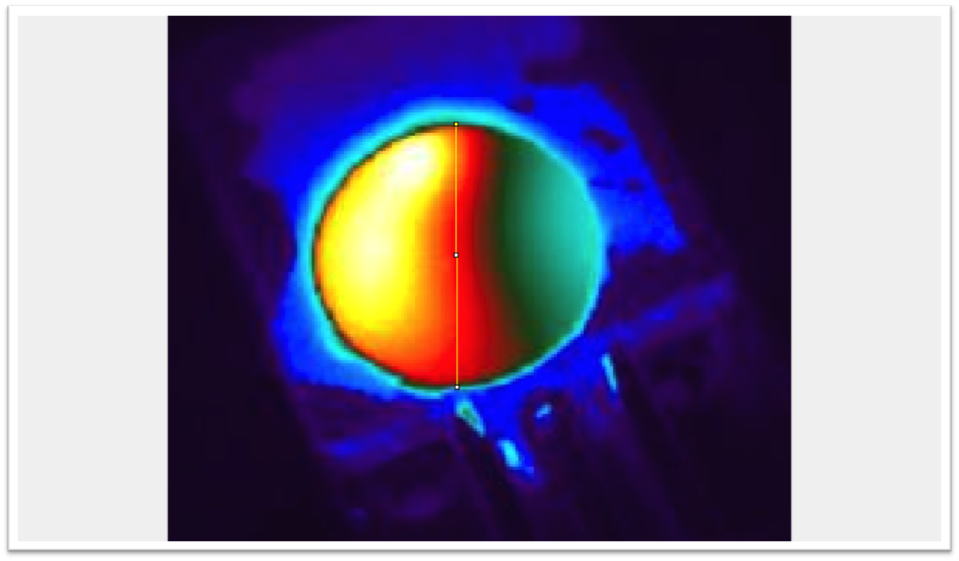 Thermal infrared imaging of a ceramic sample during photothermal heating.